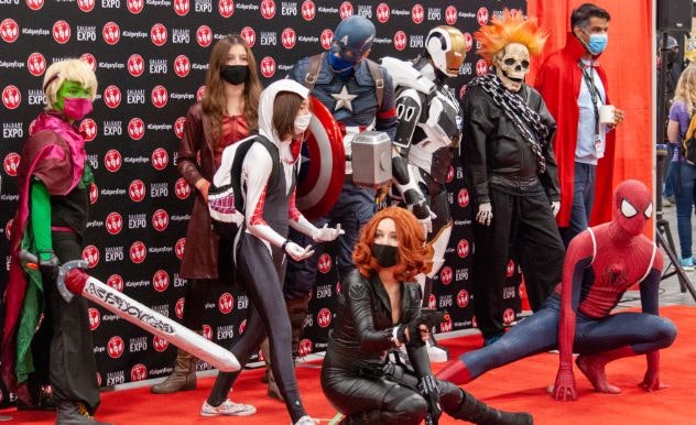 A group of Marvel cosplayers pose together on the Cosplay Red Carpet