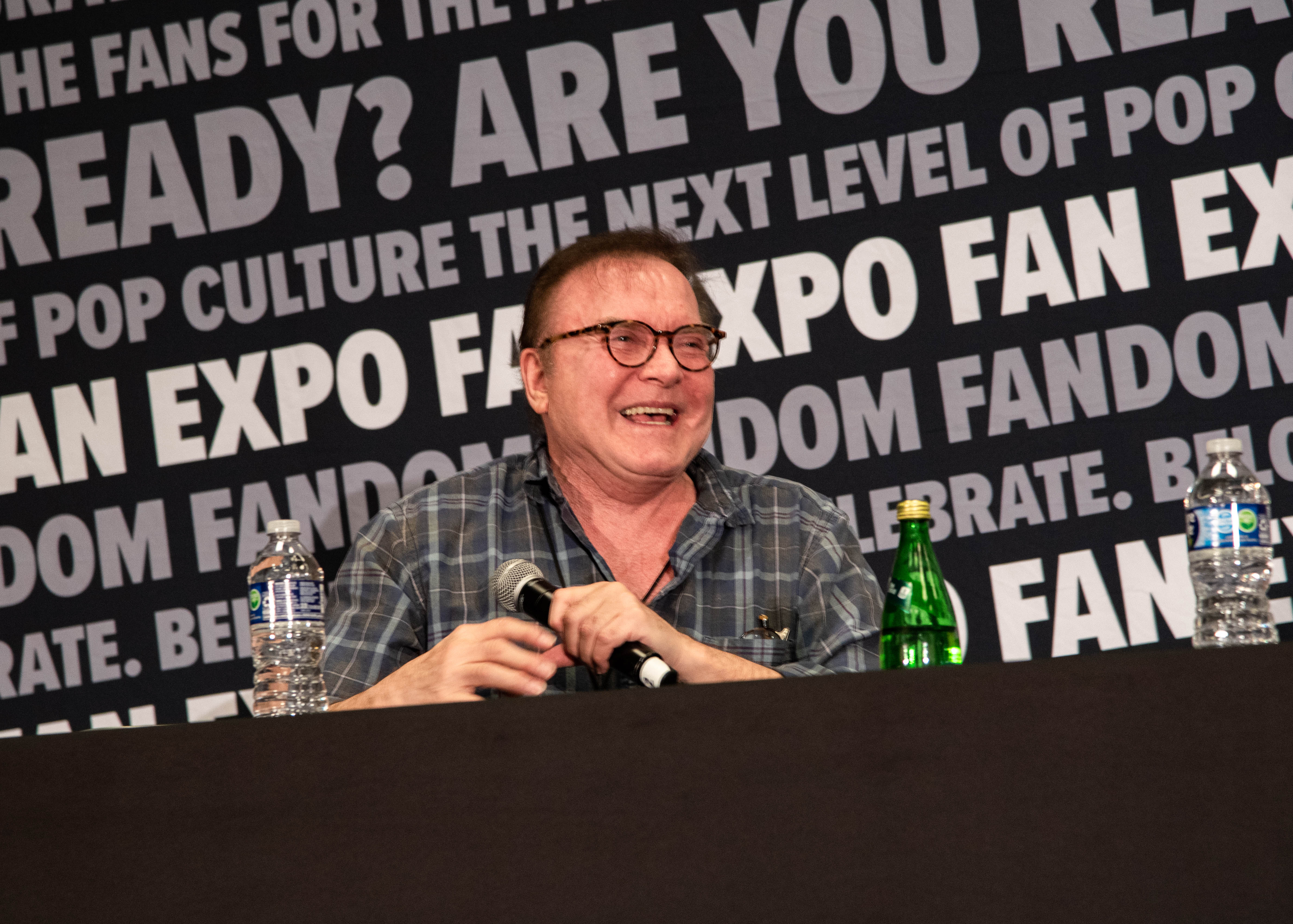 Billy West smiling at his panel.