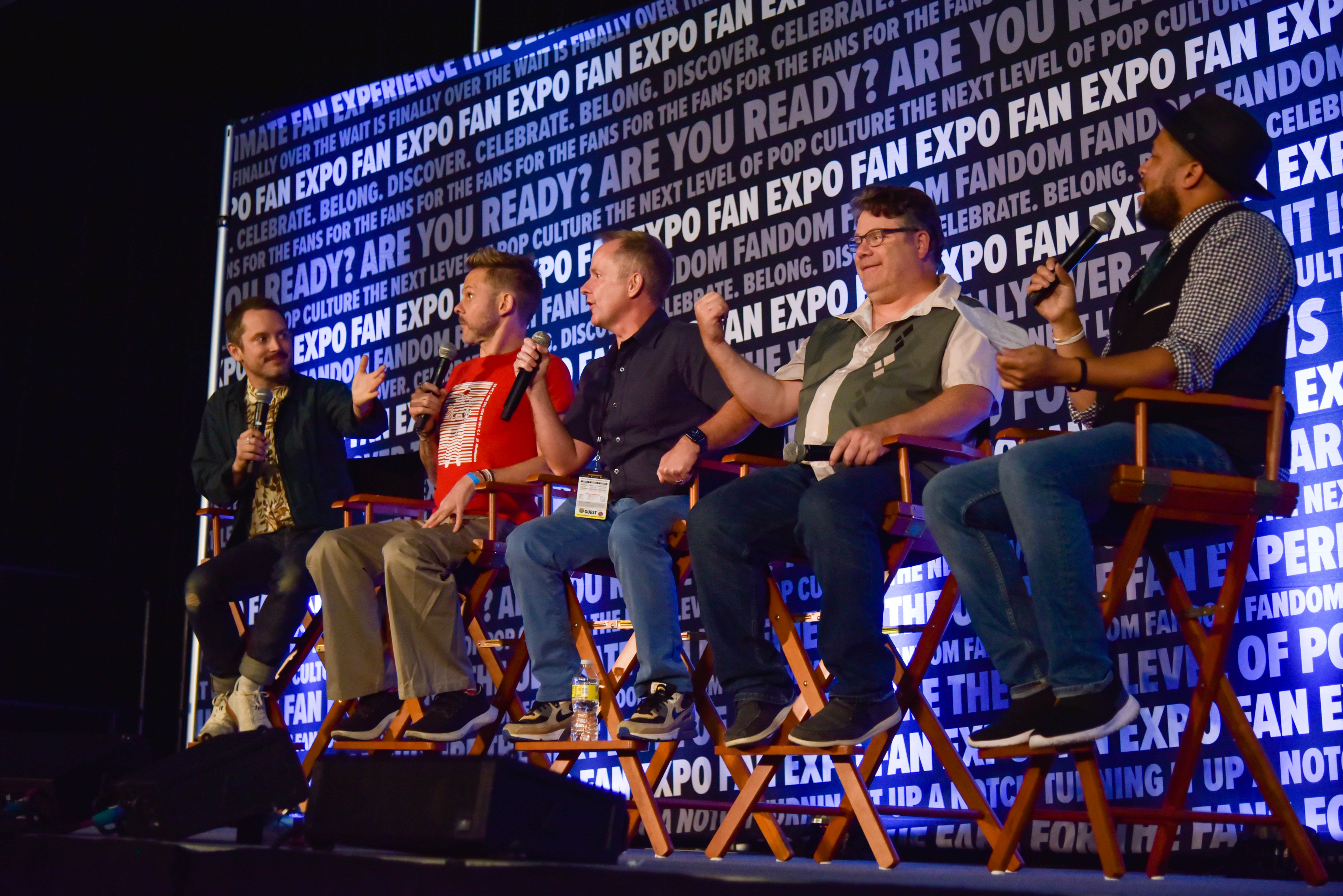 The Hobbits from the Lord of the Rings at their panel. From left to right: Elijah Wood, Dominic Monaghan, Billy Boyd, and Sean Astin.
