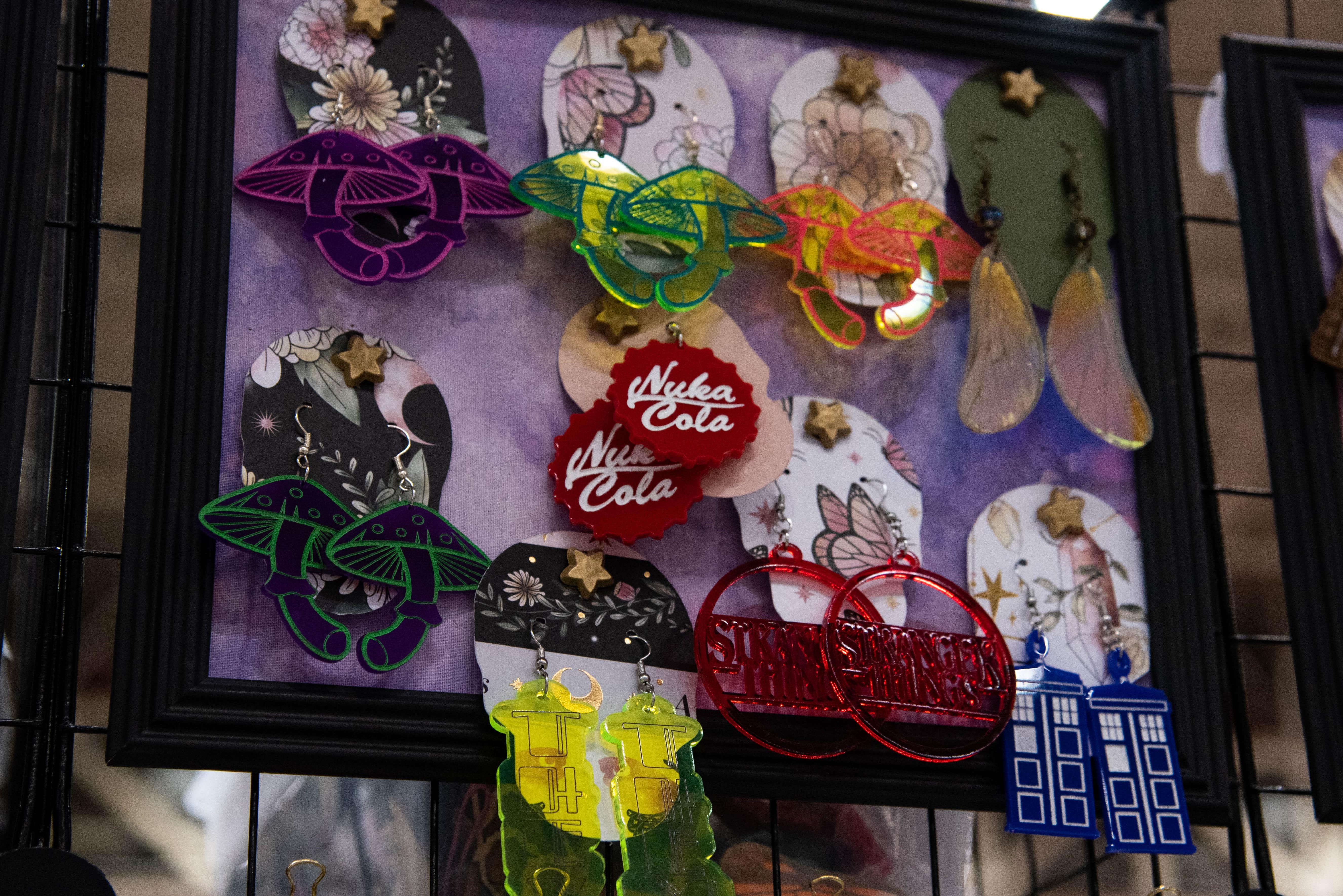 Various earrings from an artist alley booth.