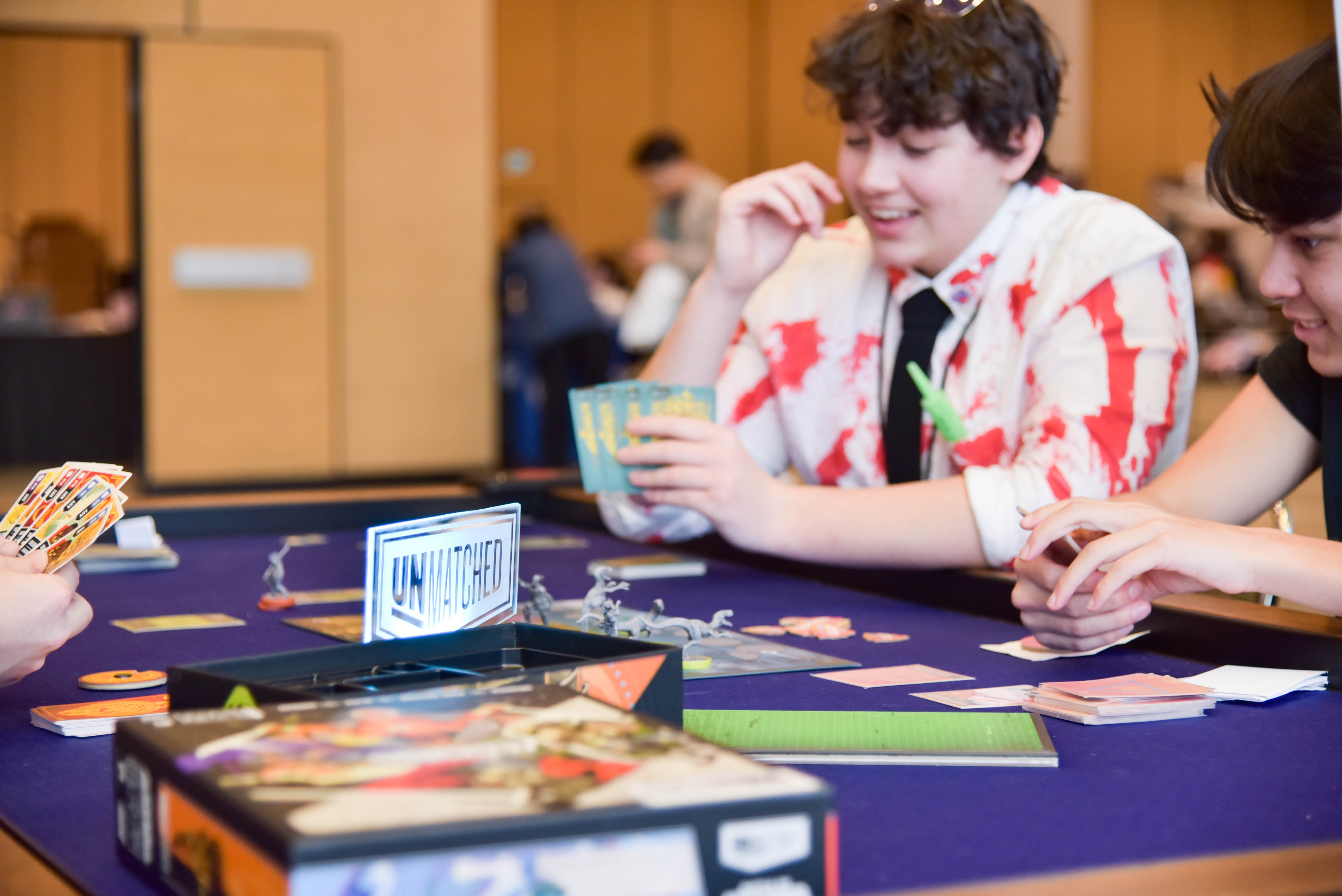 Unmatched Gamed with 3 people playing an smiling