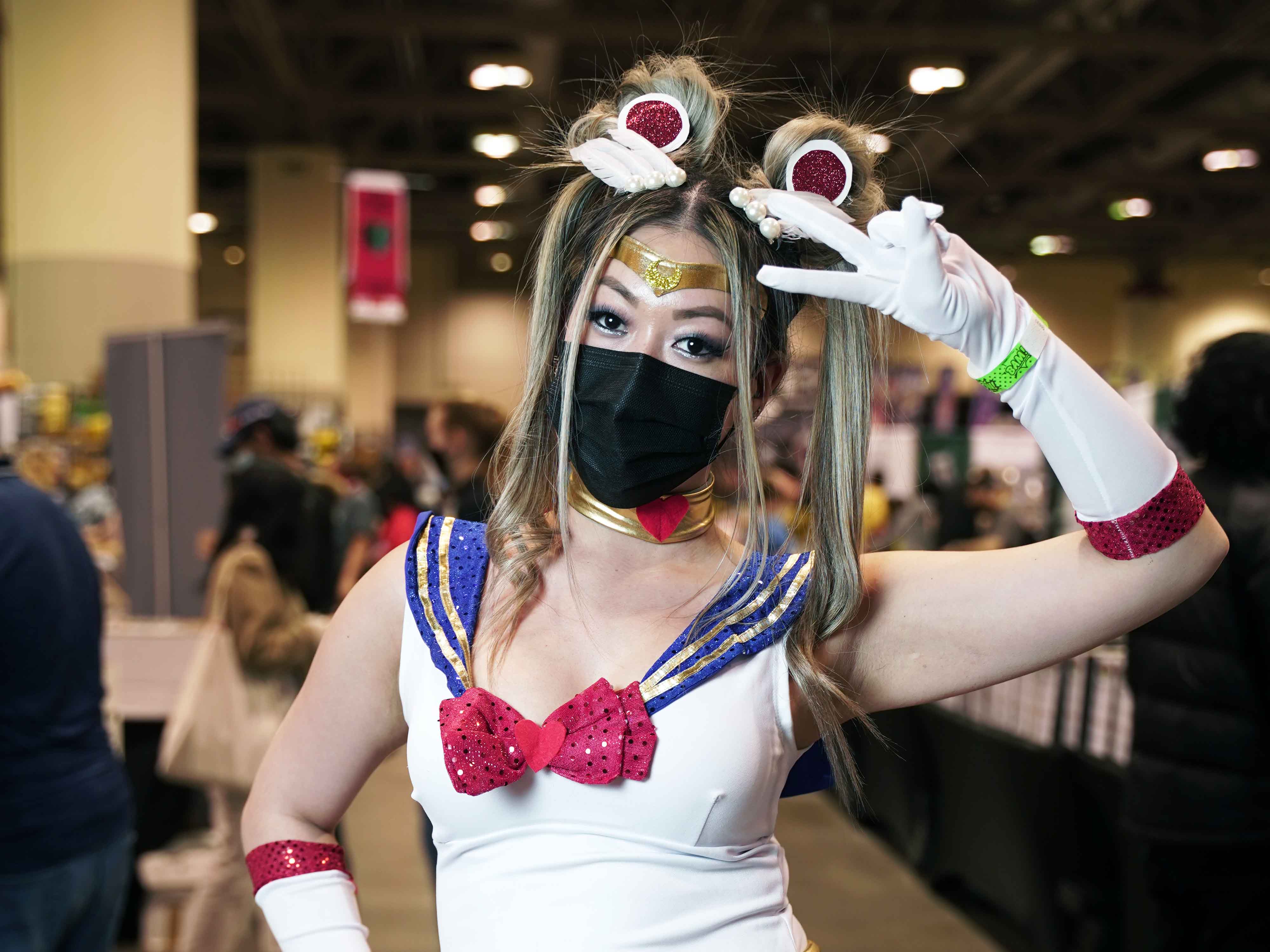 Sailor Moon cosplayer giving a peace sign