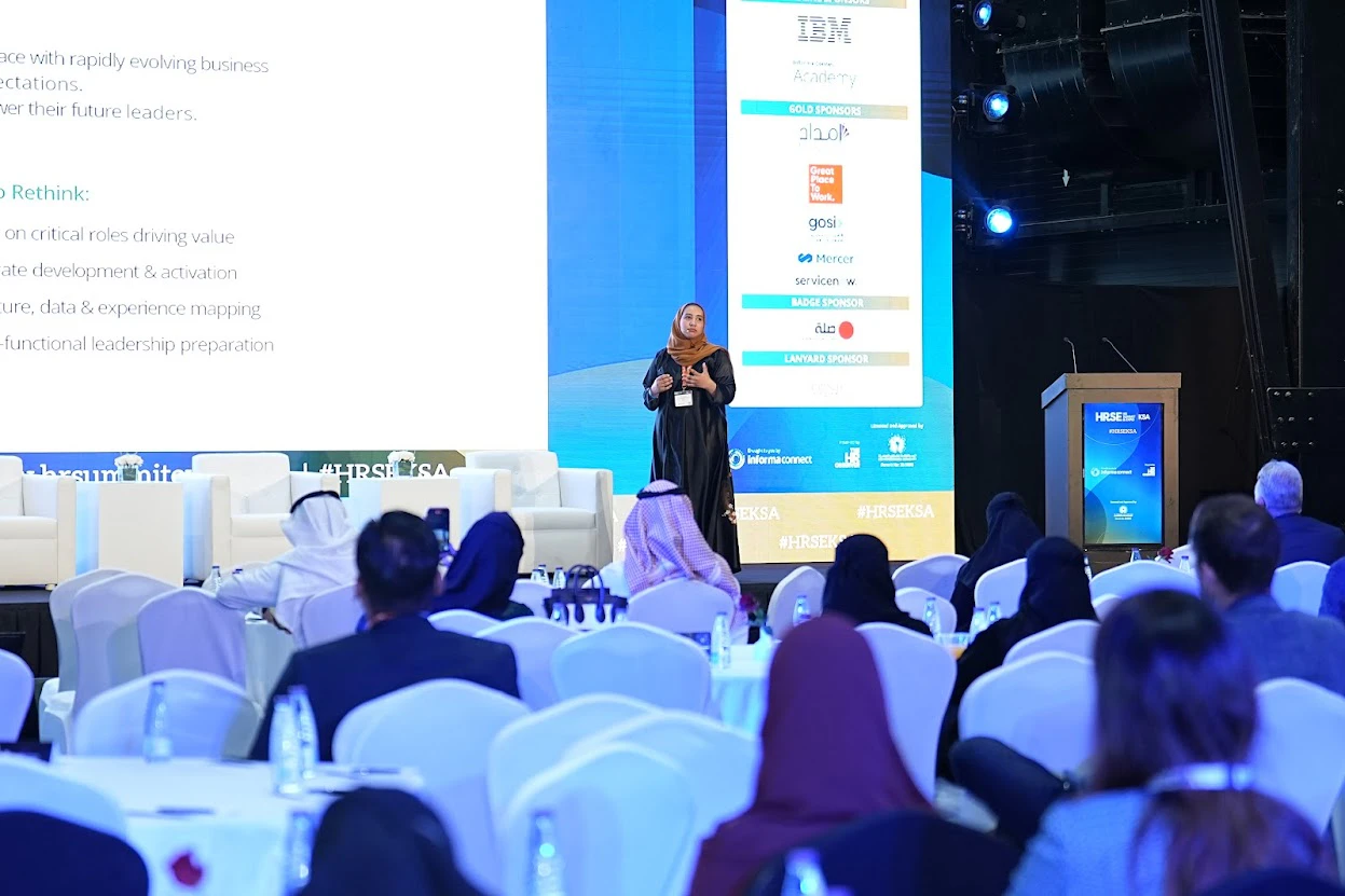 Diverse audience listening to a presenter at HRSE Egypt