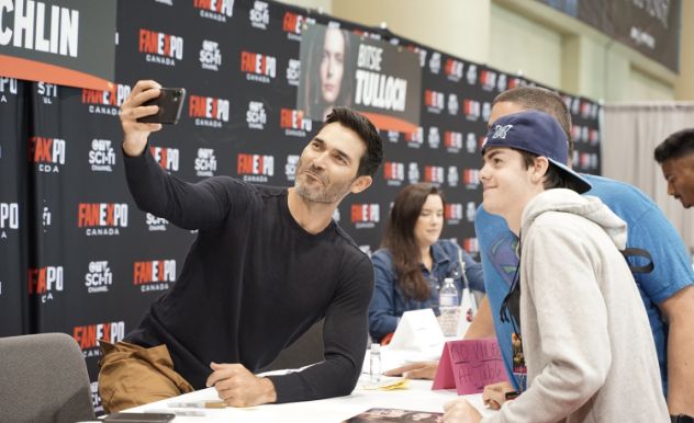 Two fans smile for the camera in cosplay at FAN EXPO Canada