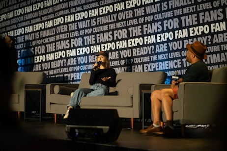 Rose McIver sitting on her panel