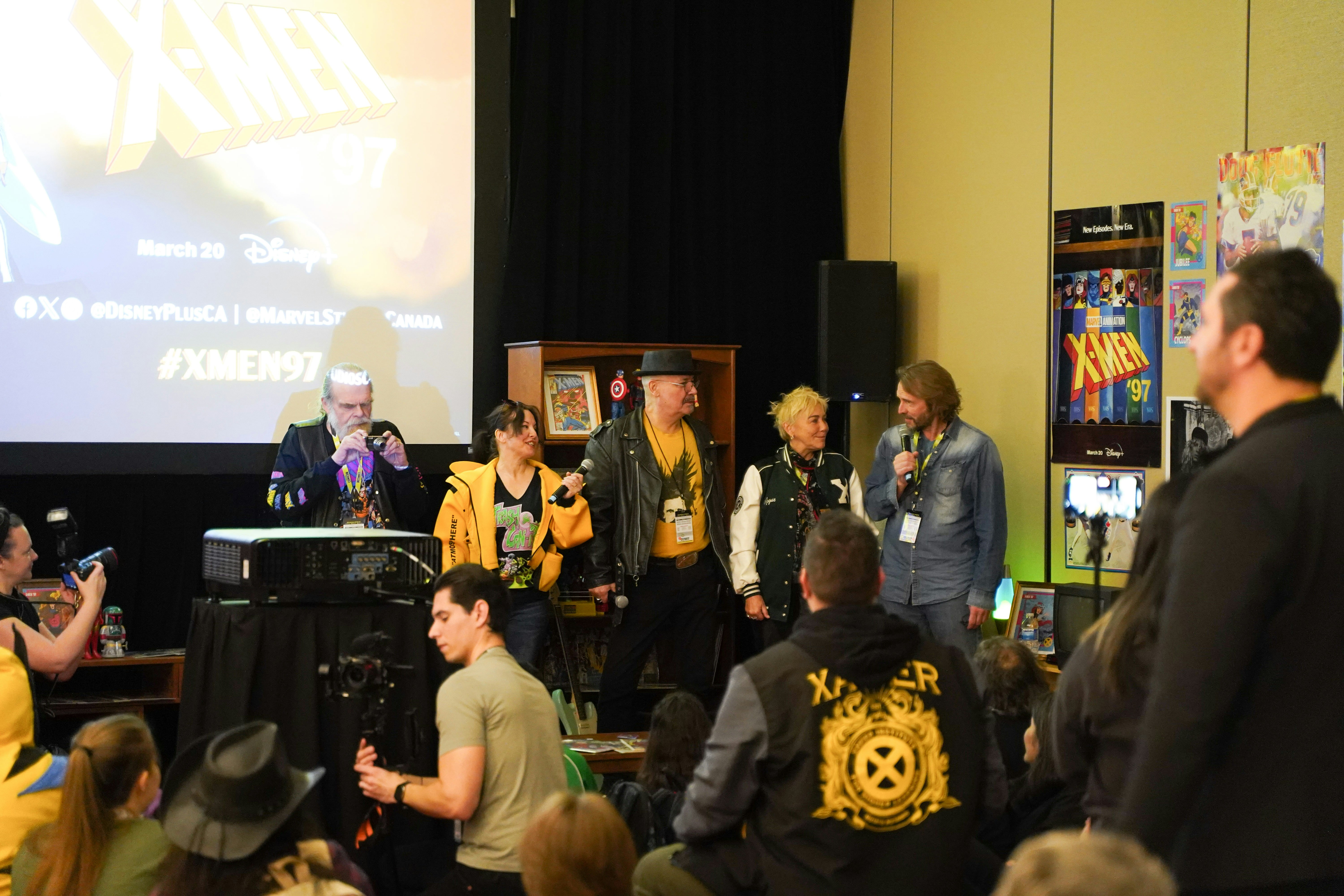 The voice cast of X-Men (Left to right: George Buza, Alyson Court, Chris Britton, Lenore Zann, Adrian Hough) addresses the audience at the official premiere screening of X-Men '97 at Toronto Comicon 2024