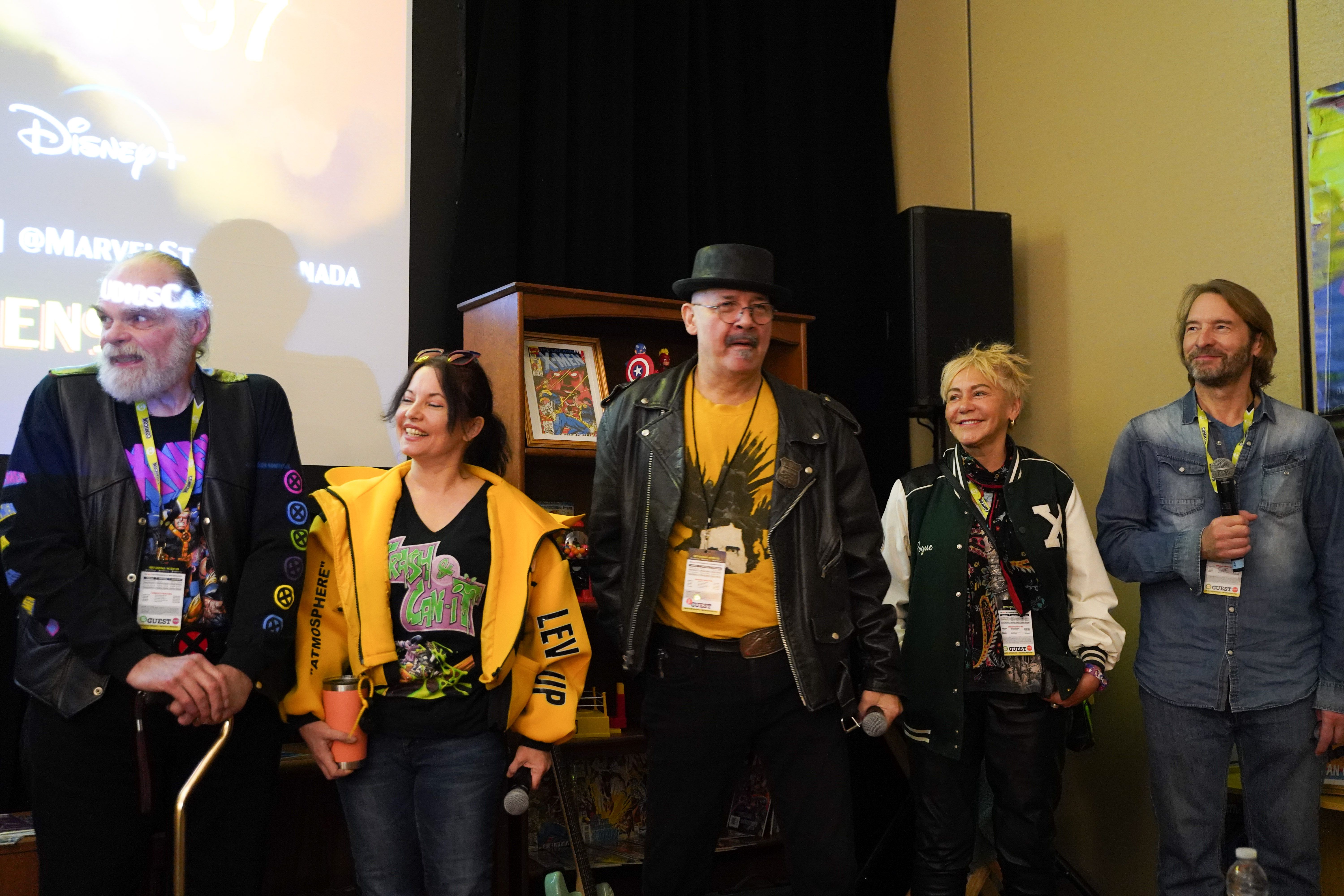 X-Men voice cast speaks to the audience at the premiere of Episode 1 for X-Men '97. Left to right - George Buza (Beast), Alyson Court (Jubilee), Chris Britton (Mr. Sinister), Lenore Zann (Rogue), and Aridan Hough (Nightcrawler)