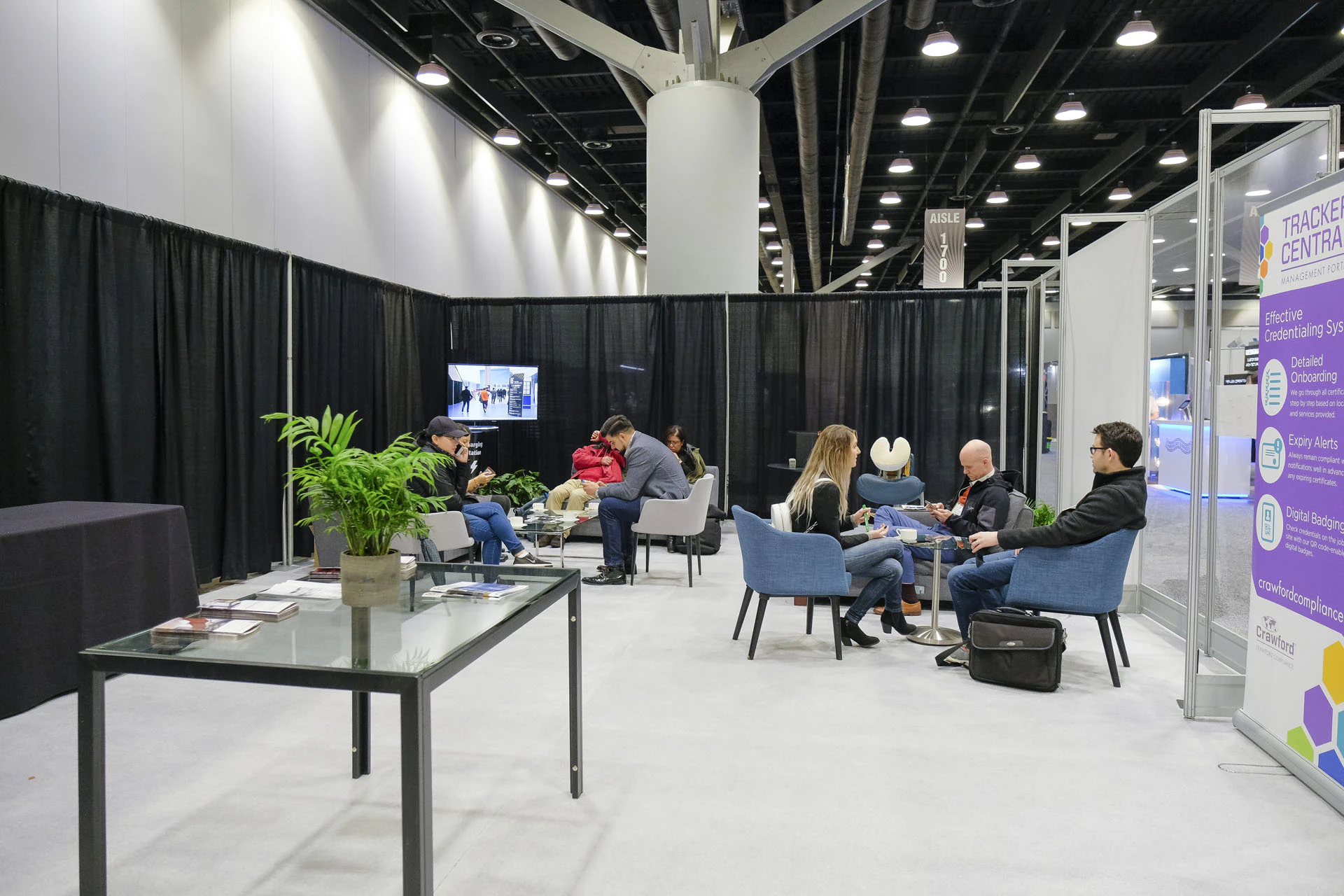 Small group of attendees in the networking lounge at BUILDEX