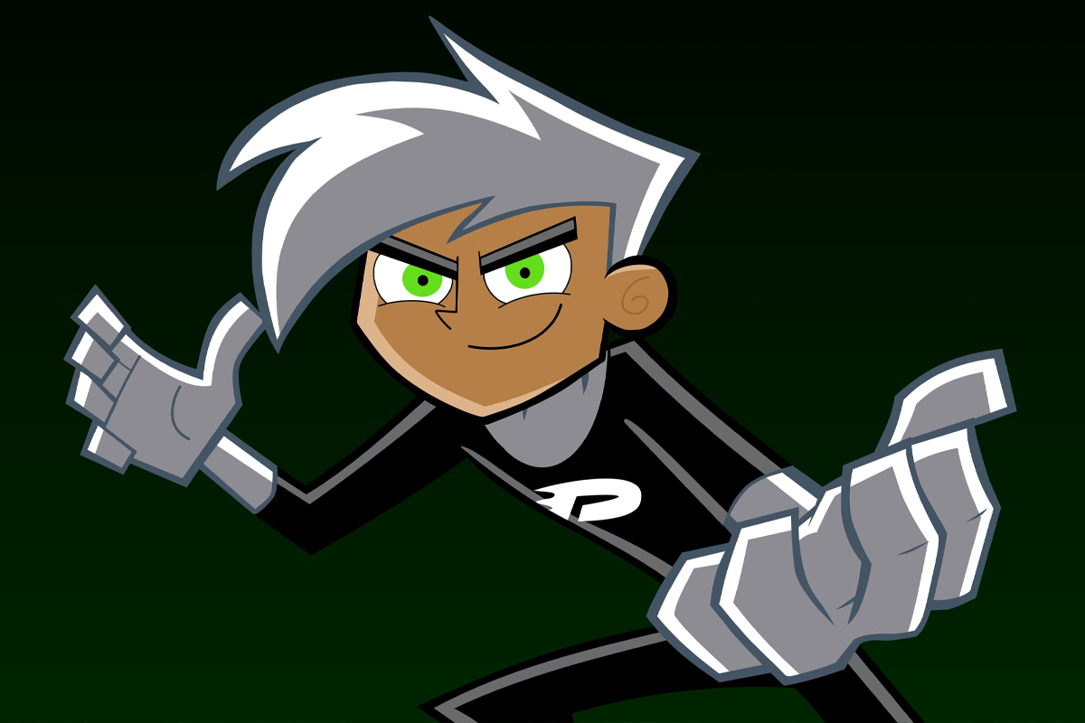 Danny Phantom poses with arms extended on a black-to-green backdrop