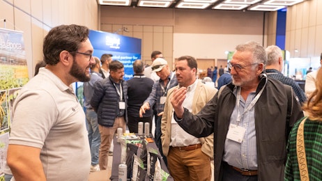 People networking in the exhibition area at Biocontrol & Biostimulants LATAM