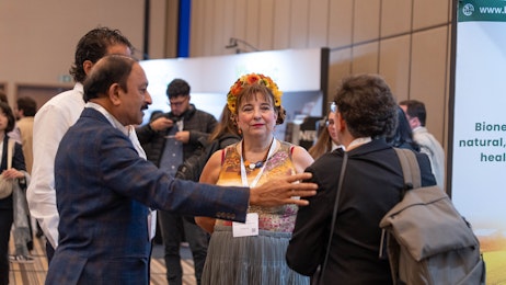 People networking in the exhibition area at Biocontrol & Biostimulants LATAM