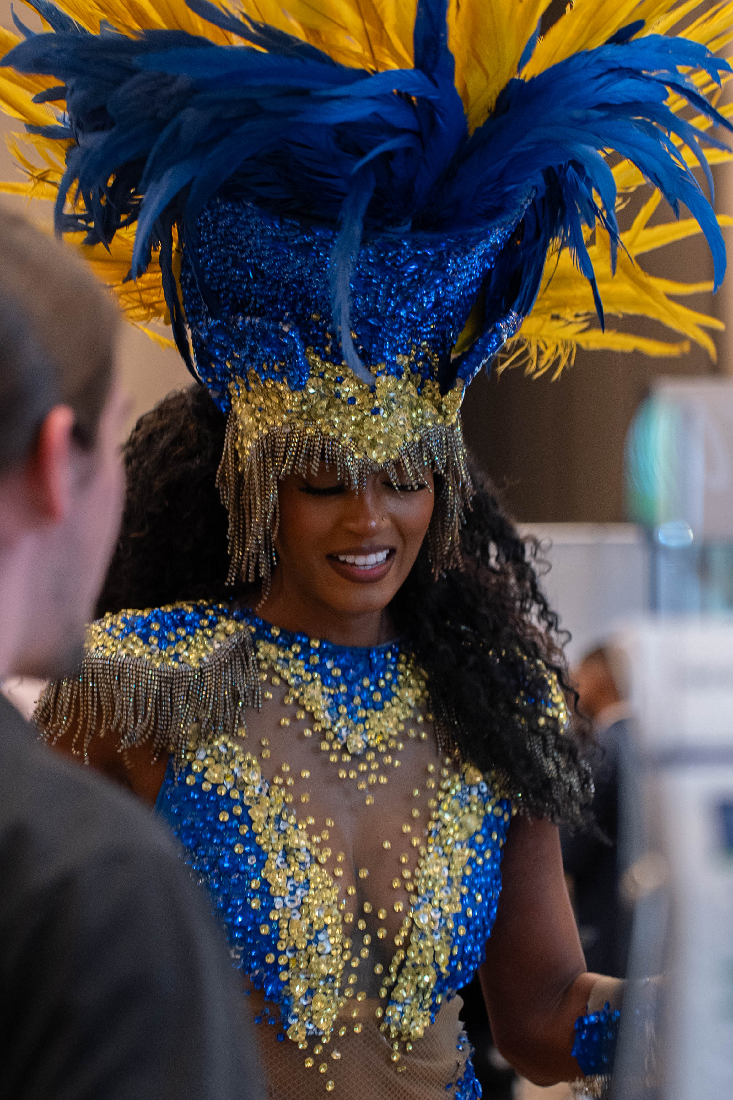 Traditional Brazilian dancer in costume at Biocontrol & Biostimulants LATAM, celebrating Latin culture and global participation.