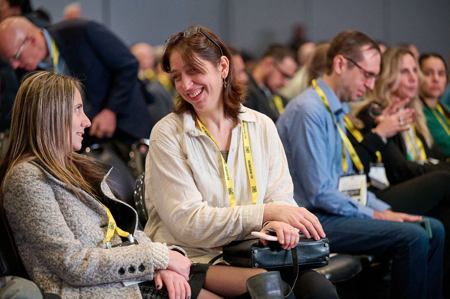 Delegates enjoying a laugh at The AI Summit New York