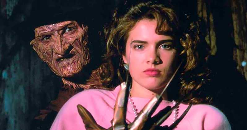 Nancy stares seriously into the camera as Freddy holders her captive, his glove coming towards her neck and face. He looks ready to strike, but surprised by Nancy's lack of reaction