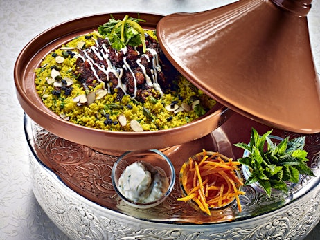 yellow rice bowl in copper bowl