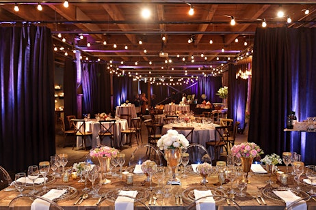 indoor event venue with purple curtains