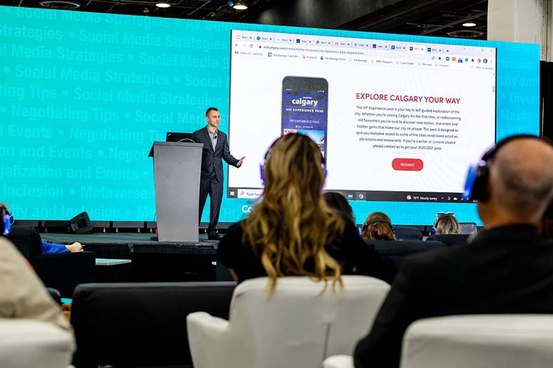 Group of event professionals dressed in white at a networking reception