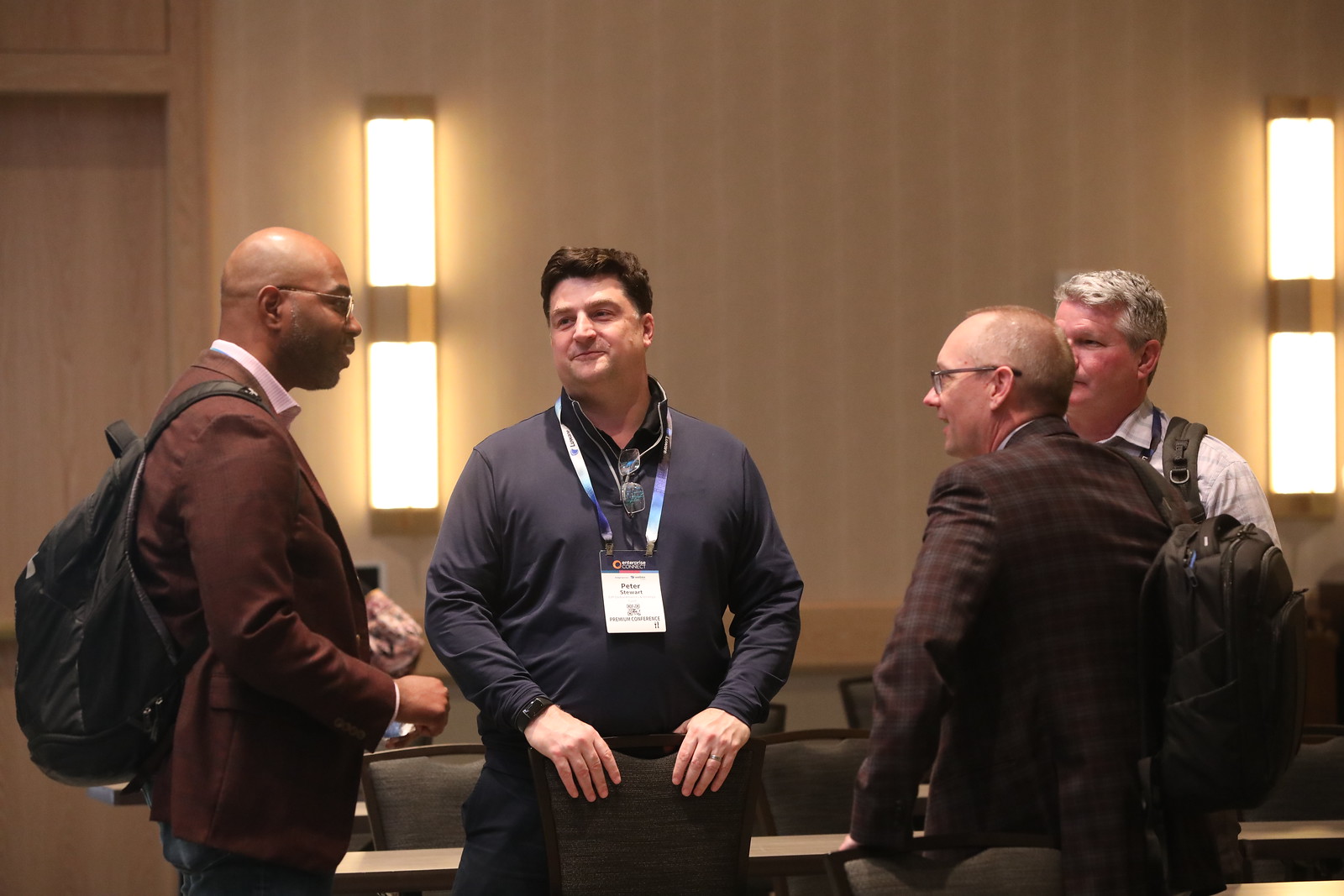 Enterprise Communications Conference attendee in a session