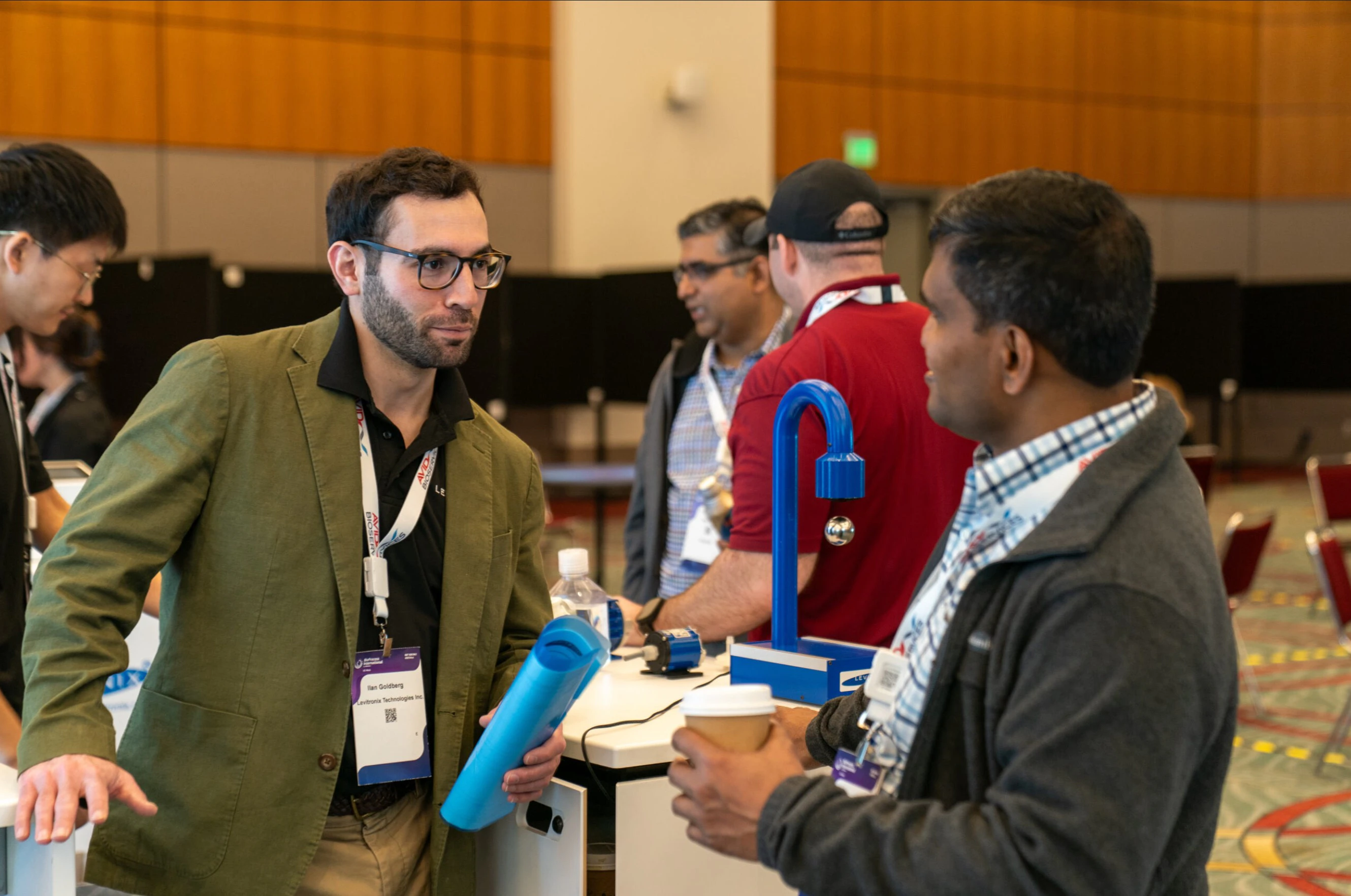 Exhibitors chatting at BPI West in San Diego