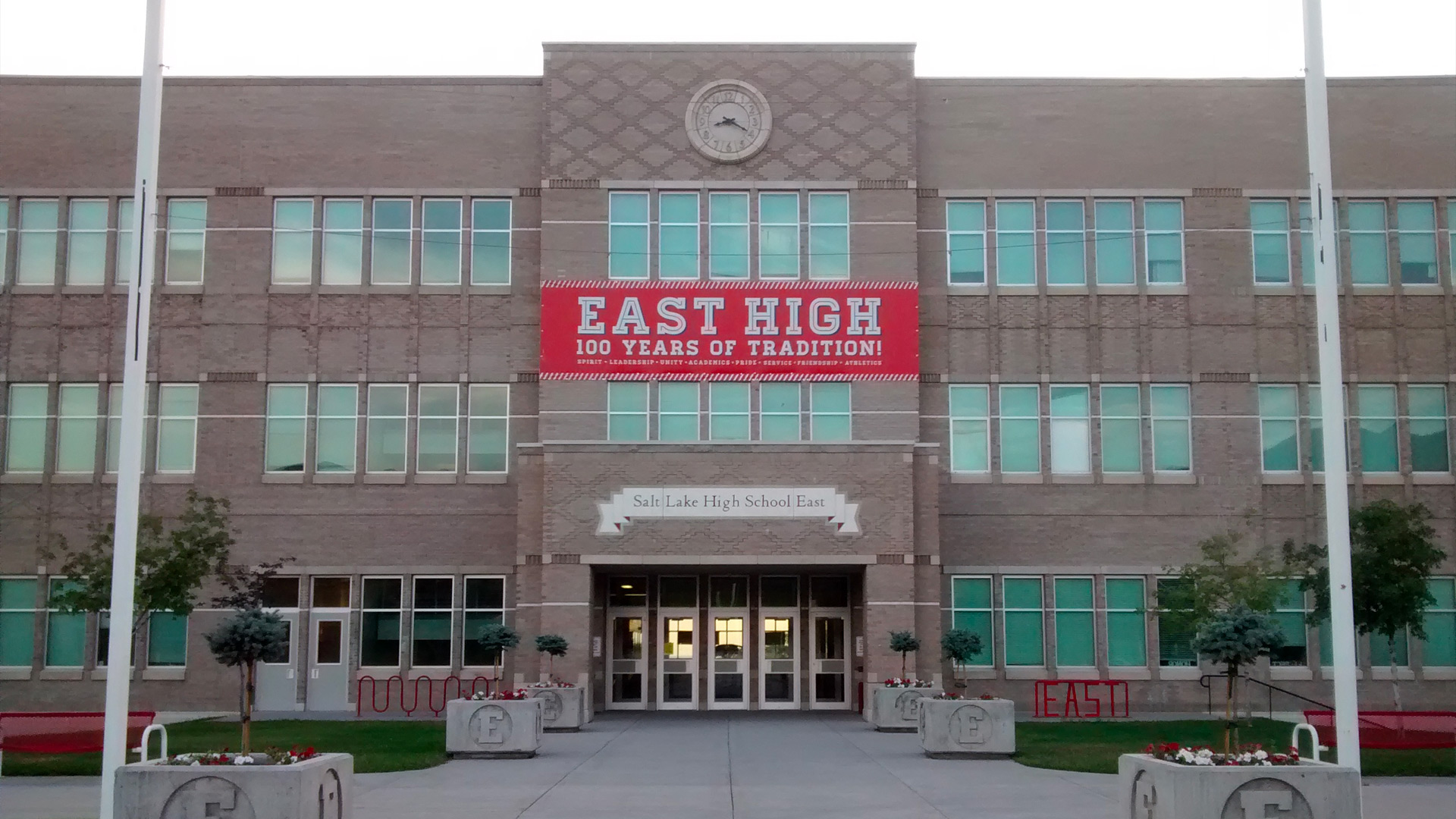 The EAST HIGH school from High School Musical with a red East High banner on the front