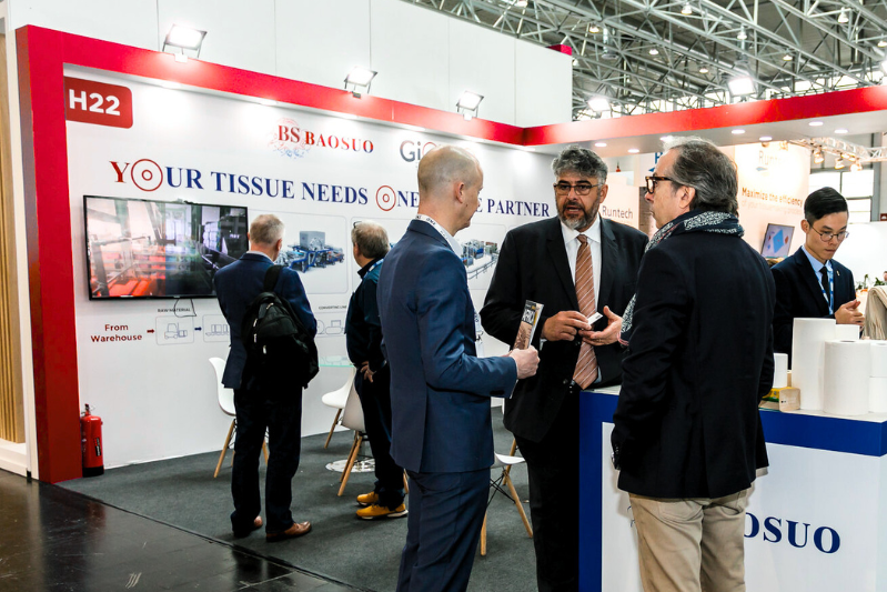 Exhibitor chatting to visitors