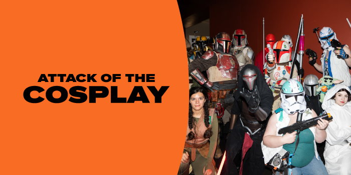A group of Star Wars–inspired cosplayers pose together in armor and character costumes during Attack of the Cosplay at FAN EXPO Cleveland. Helmets, props, and layered costumes create a dramatic group scene.