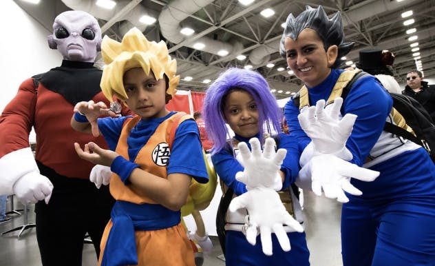 anime cosplayers posing for Photo Op