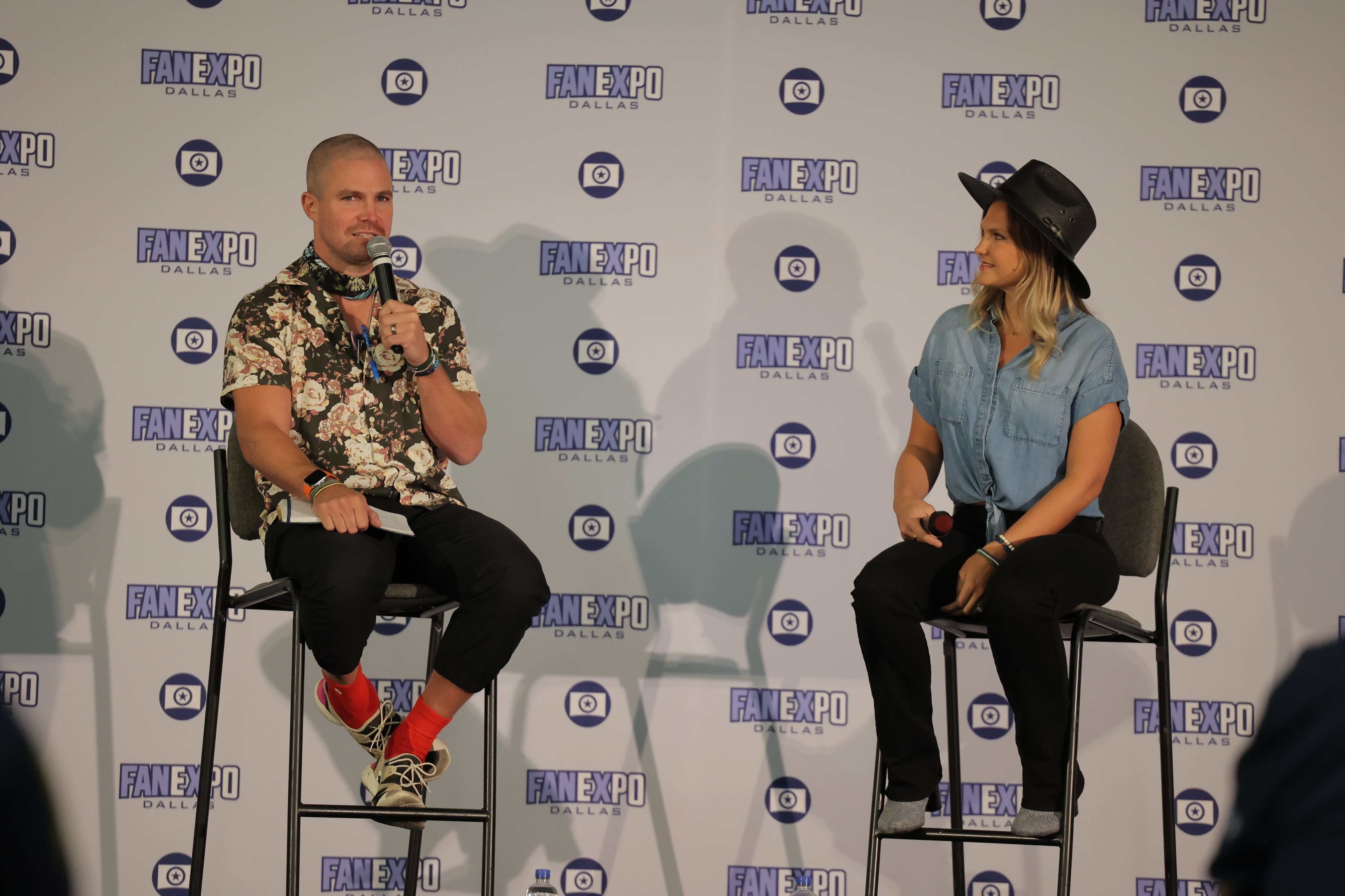 Stephen Amell looks awkward as he answers a question on stage