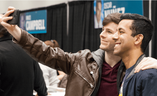 Walking Dead actor Chandler Riggs taking photo with a fan