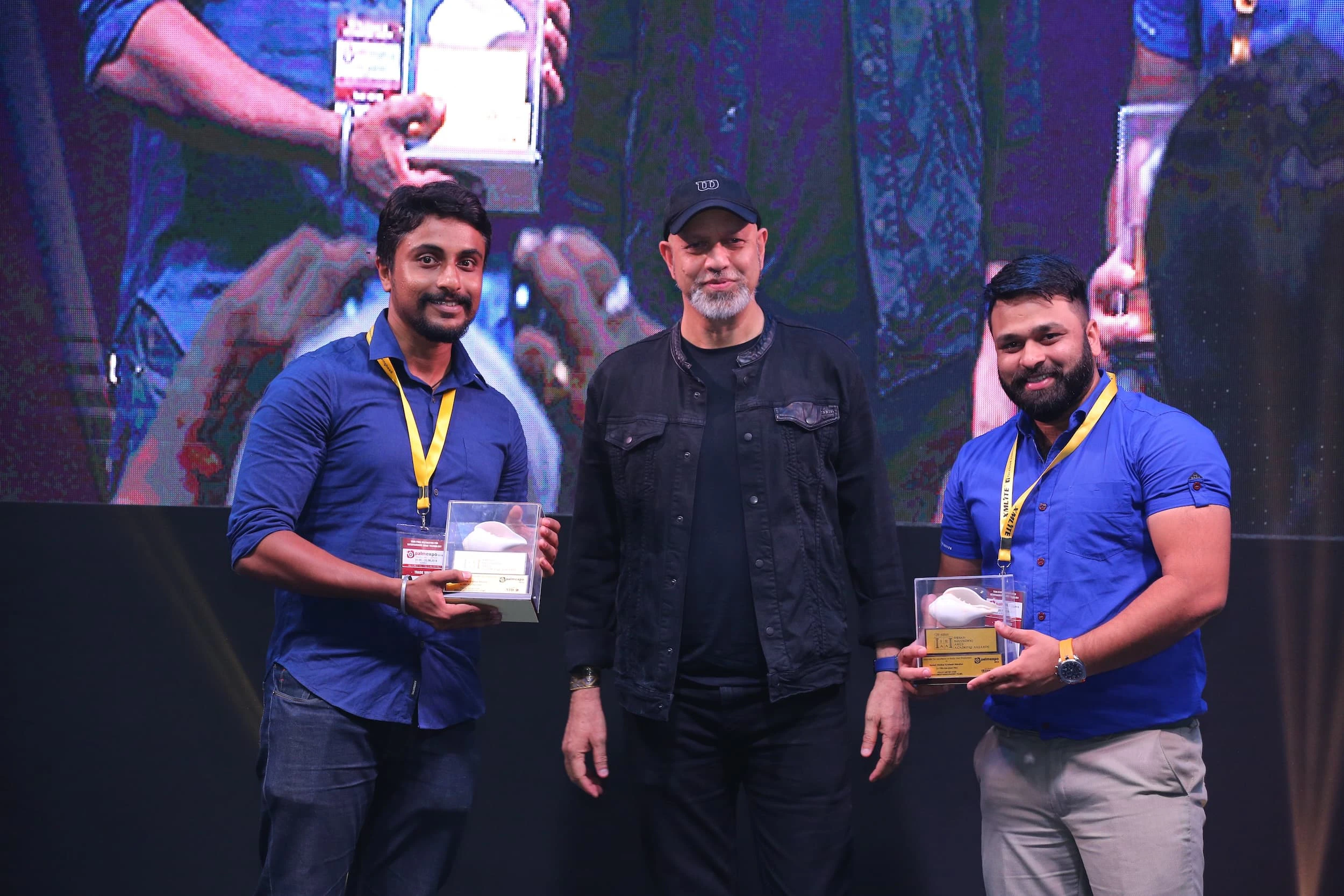 Foley Artists Sanket Dhotkar & Adwait Walujkar, receive their award from Loy Mendonsa fo Film Tiffin