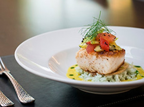 fish on a plate with rice