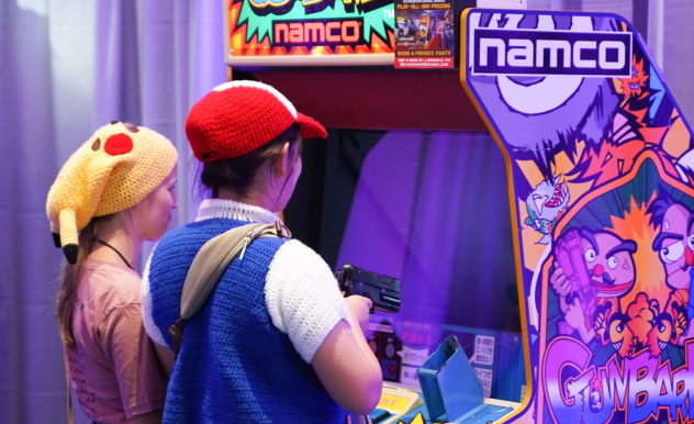 gaming station with fans playing PC games