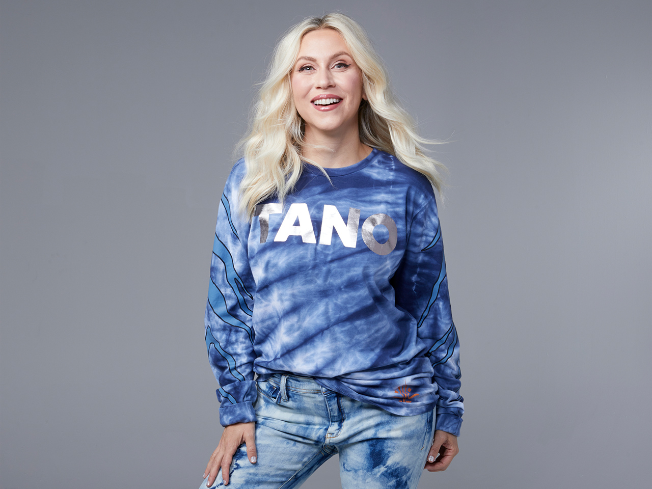 Ashley wearing a Tano sweatshirt