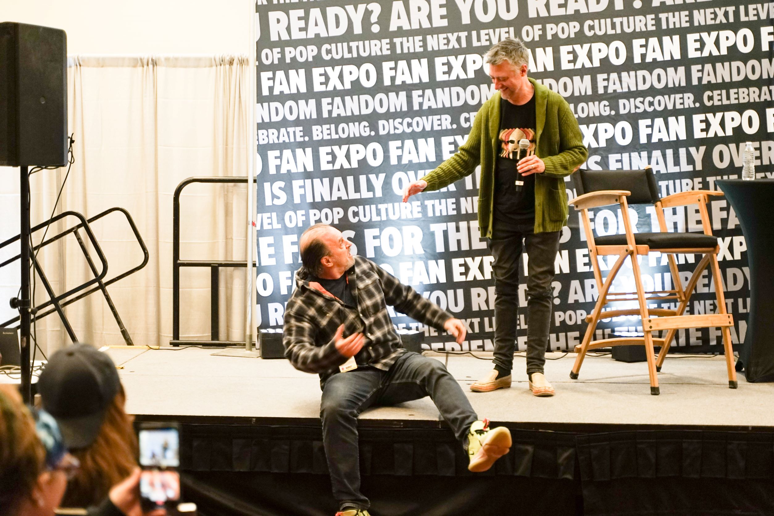 Sean Gunn and Scott Patterson sit on-stage at Toronto Comicon for their panel.