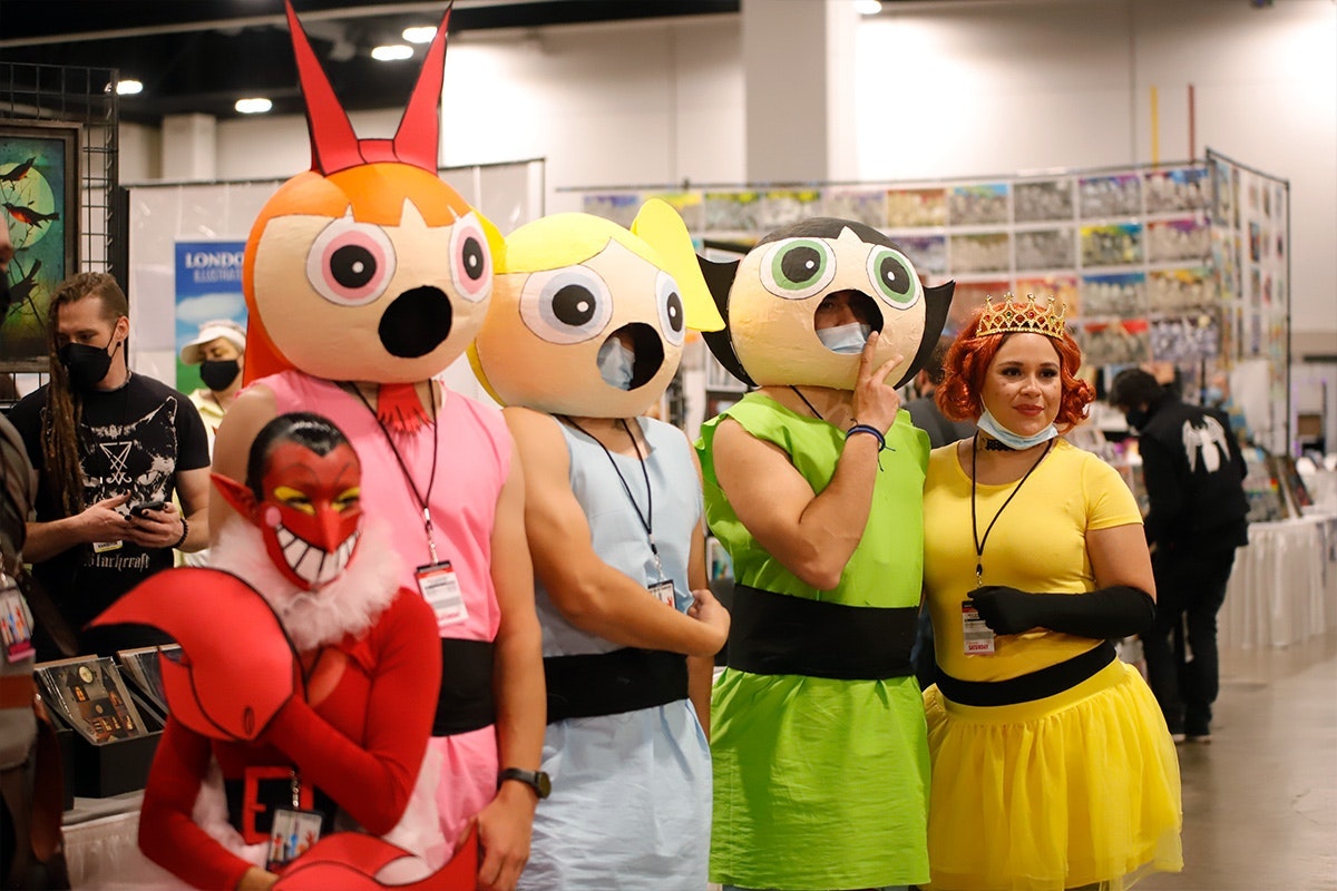 A group of evil Power Puff Girls cosplayers pose for a photo together