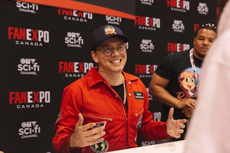 Logic smiling at a fan