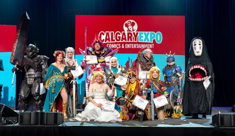 A group of cosplayers are on stage during the awards ceremony for the Cosplay Craftsmanship Cup at CALGARY EXPO 2023