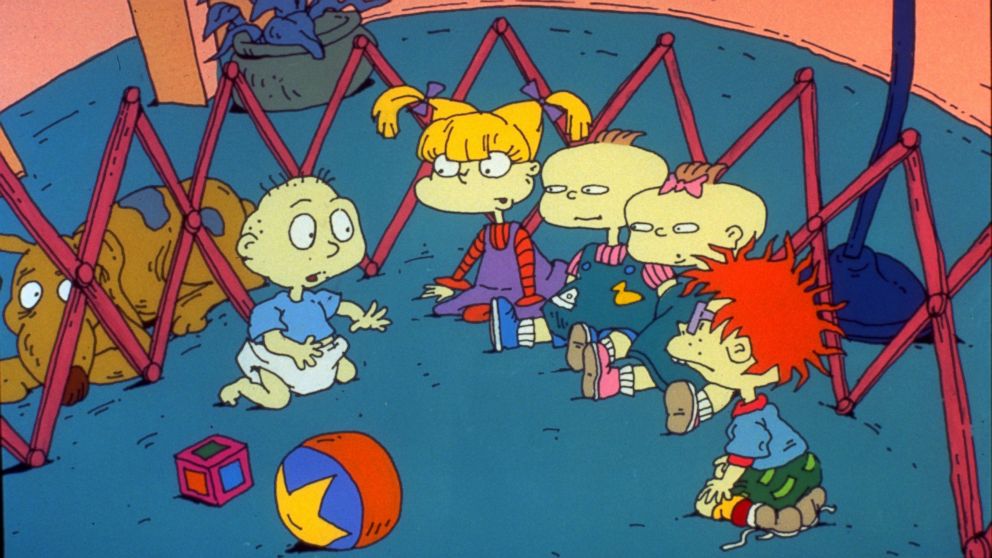Tommy Pickles and his Rugrats friends sit in a baby pen and speak