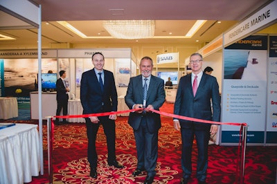 Cutting the Ribbon at IHMA Opening