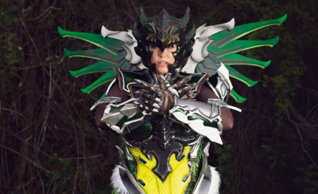 Avera Cosplay as a character with metal armour and green metal wings