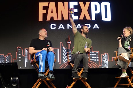 Charlie Cox holds up a bag of all dressed chips