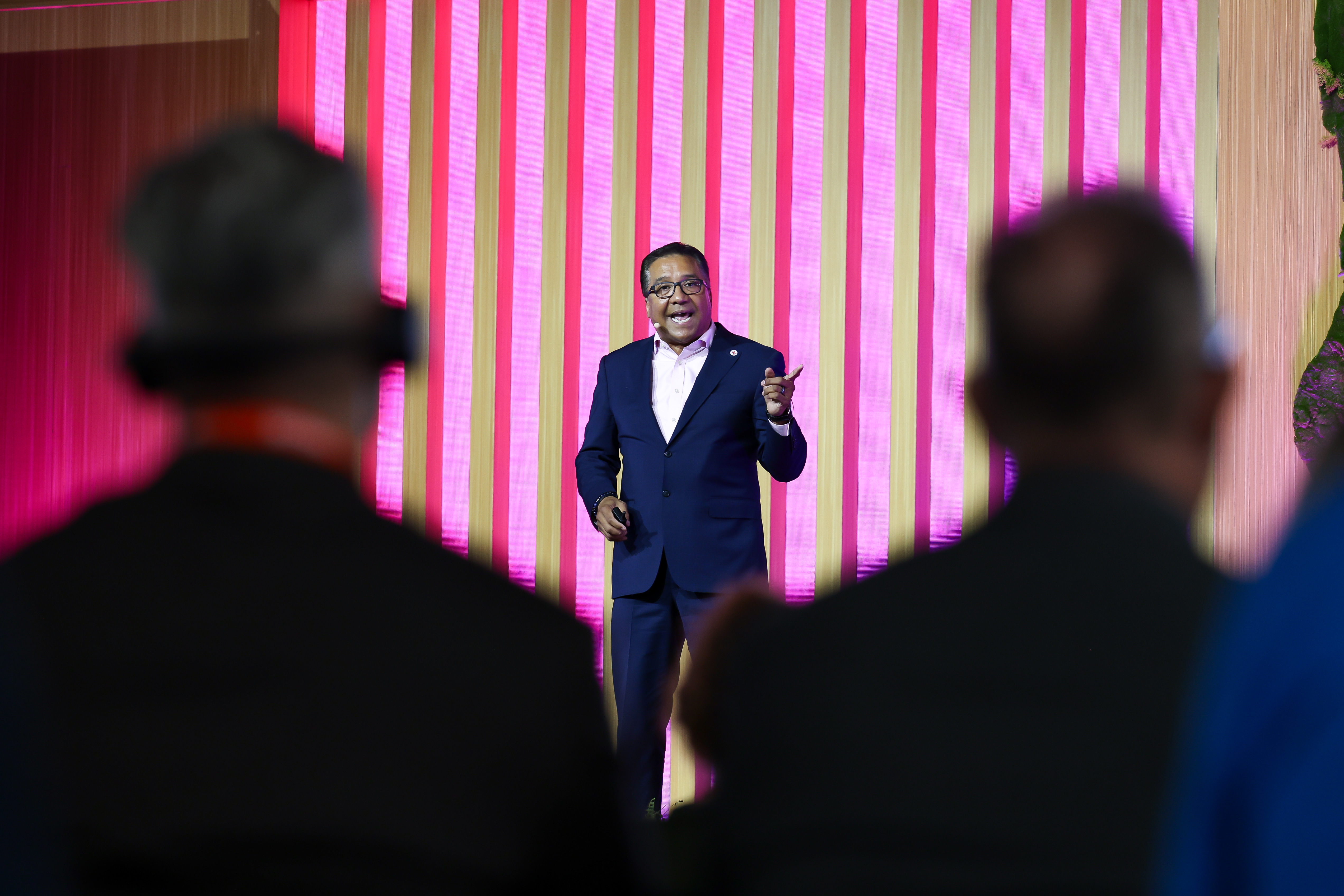 Michael Dominguez on stage leading an education session at Connect Marketplace 2024.