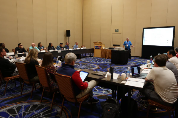 Instructor Greg Sanker teaches an interactive ITIL® Foundation (Version 5) training session to a classroom of IT professionals.