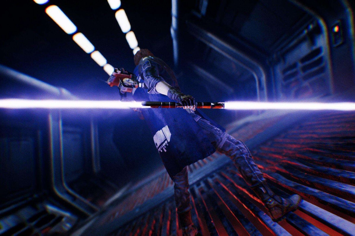 Cal Kestis from Jedi Fallen Order with his Indigo lightsaber activated and BD-1 peering over his shoulder