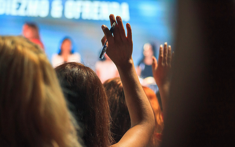 Raised hands in a conference session