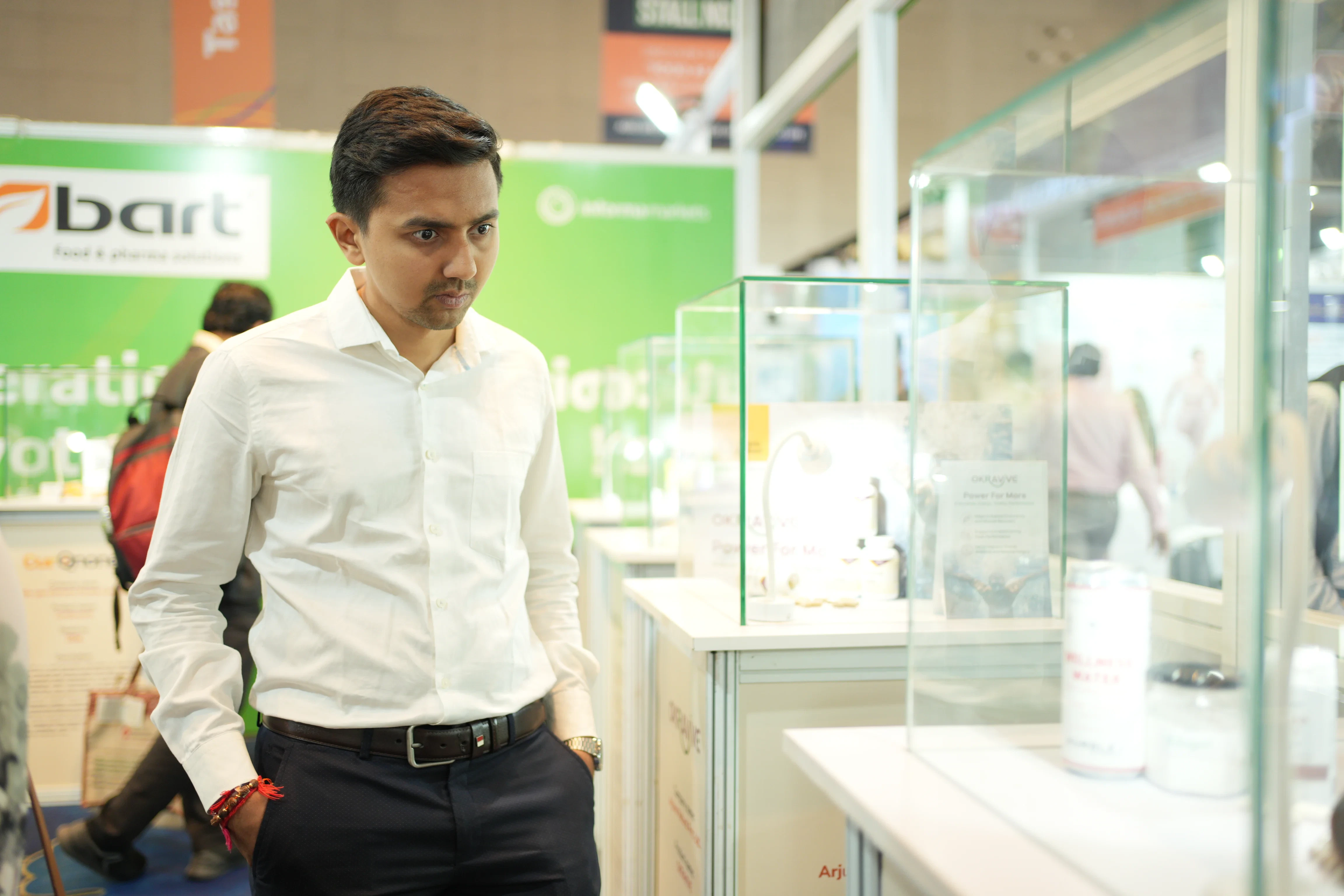 Delegate looking at product in Vitafood India Expo