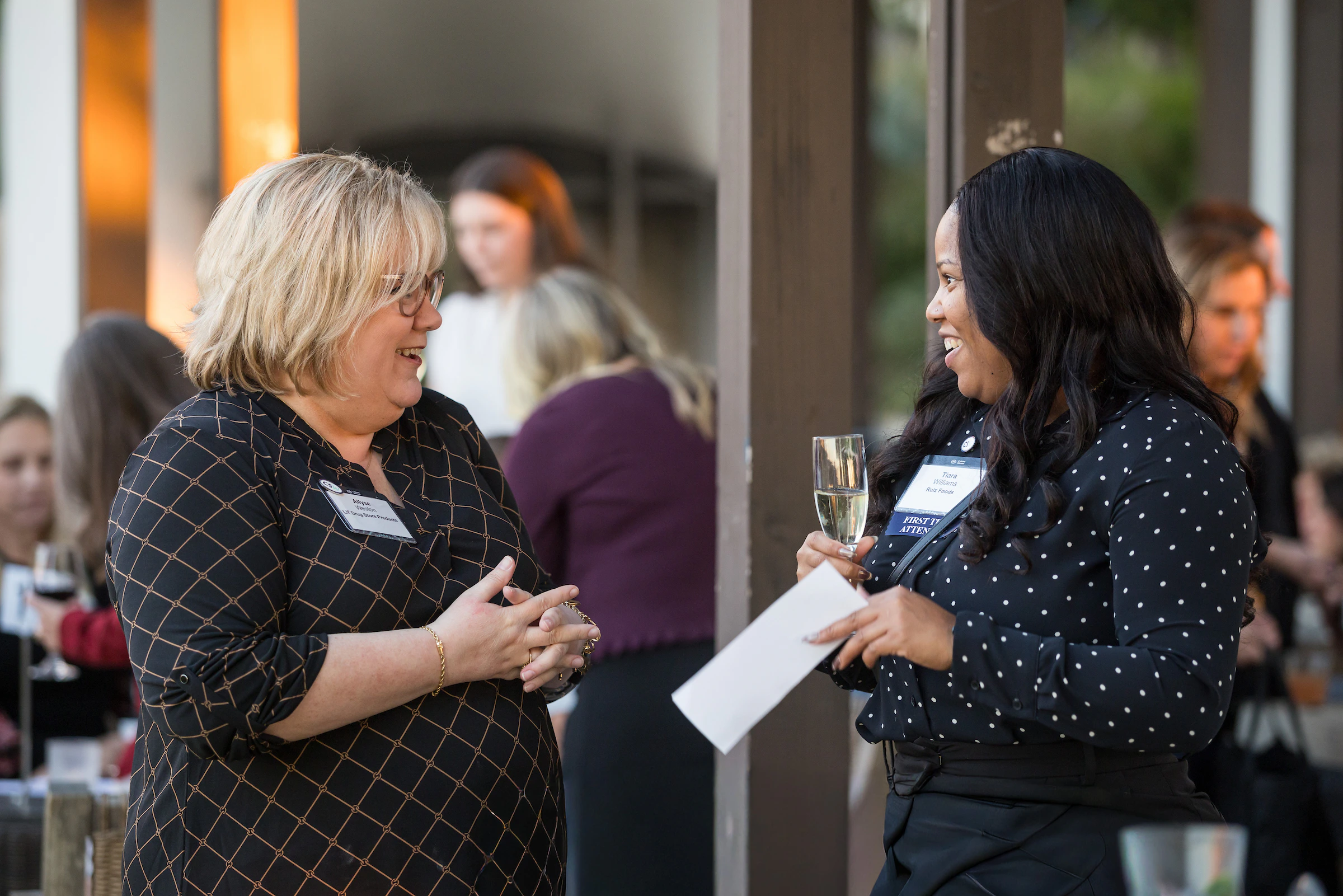 Women chatting at CSW 2025