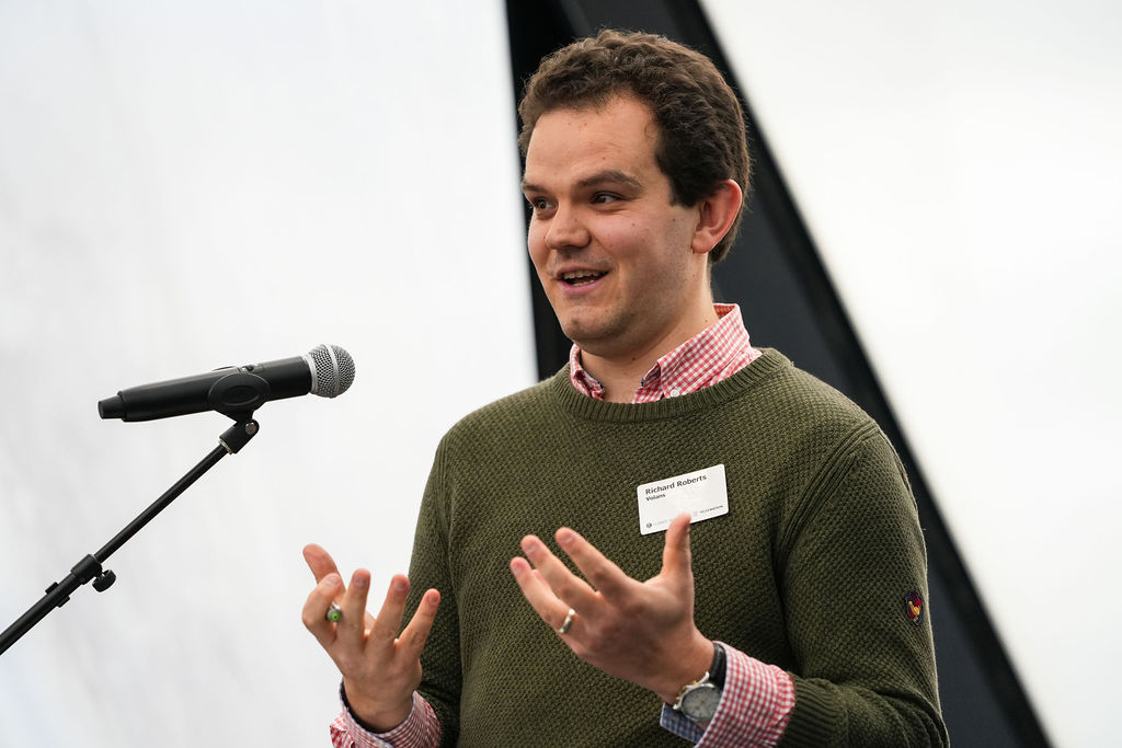 Man talking on stage