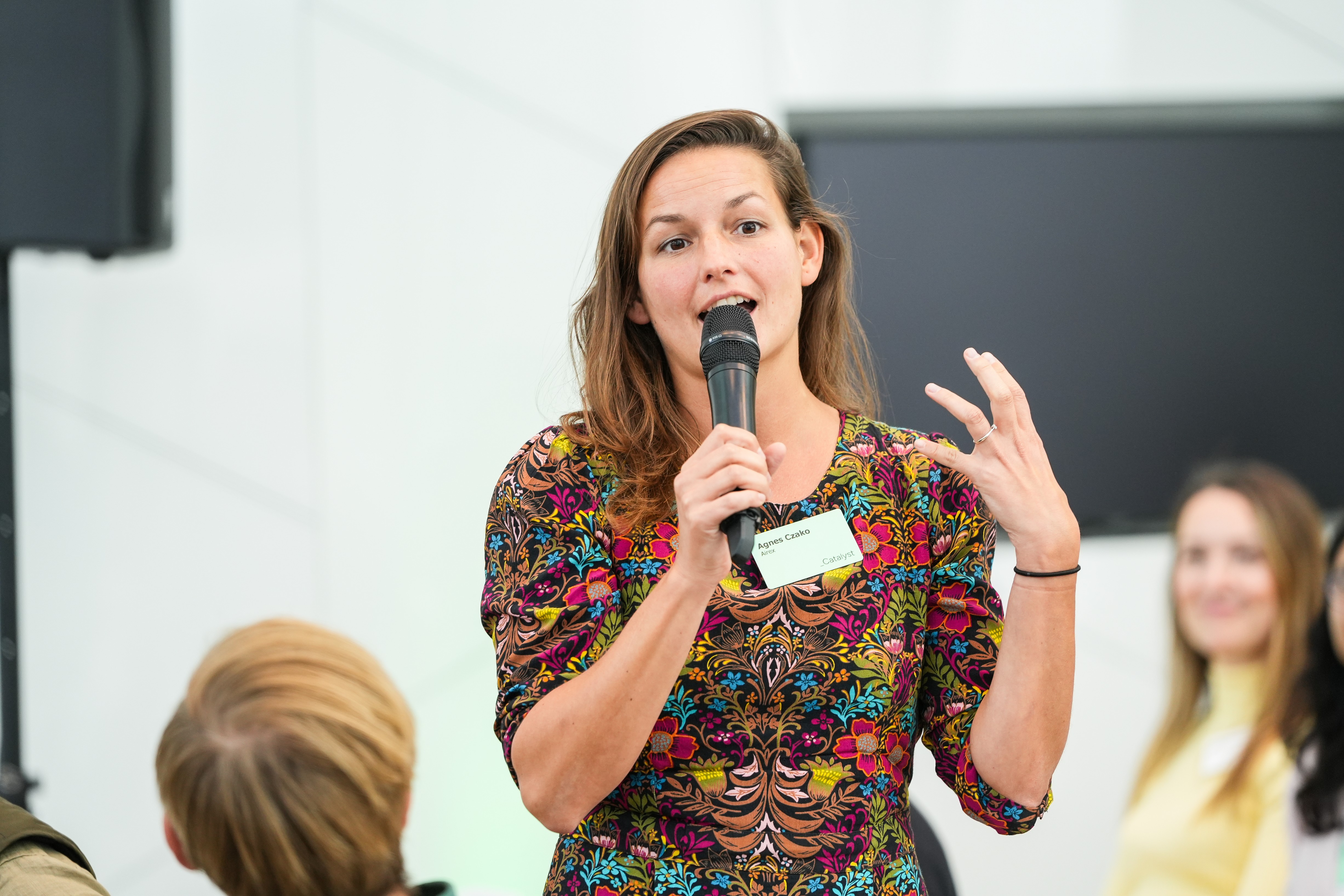 Women asking a question