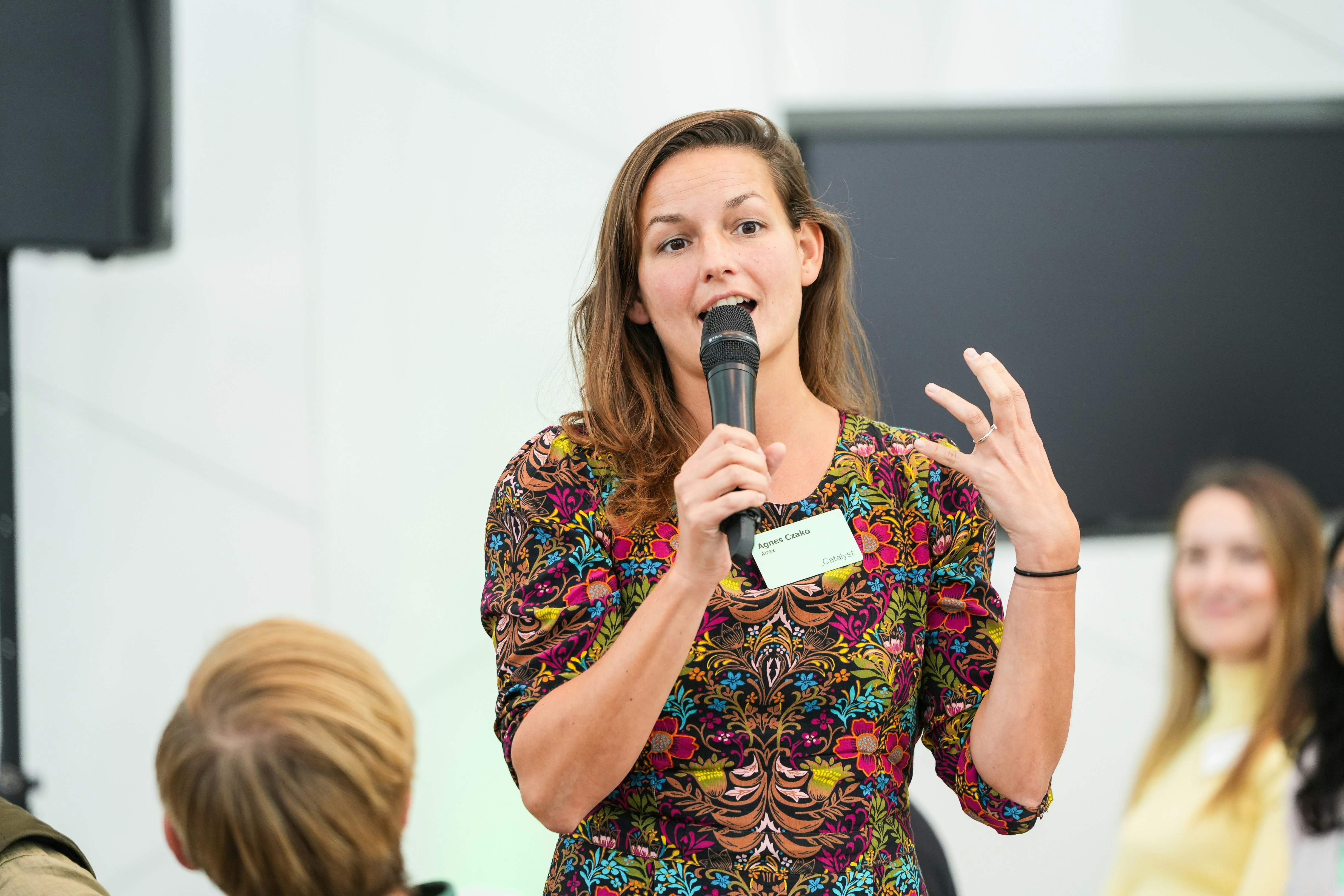 Women asking a question